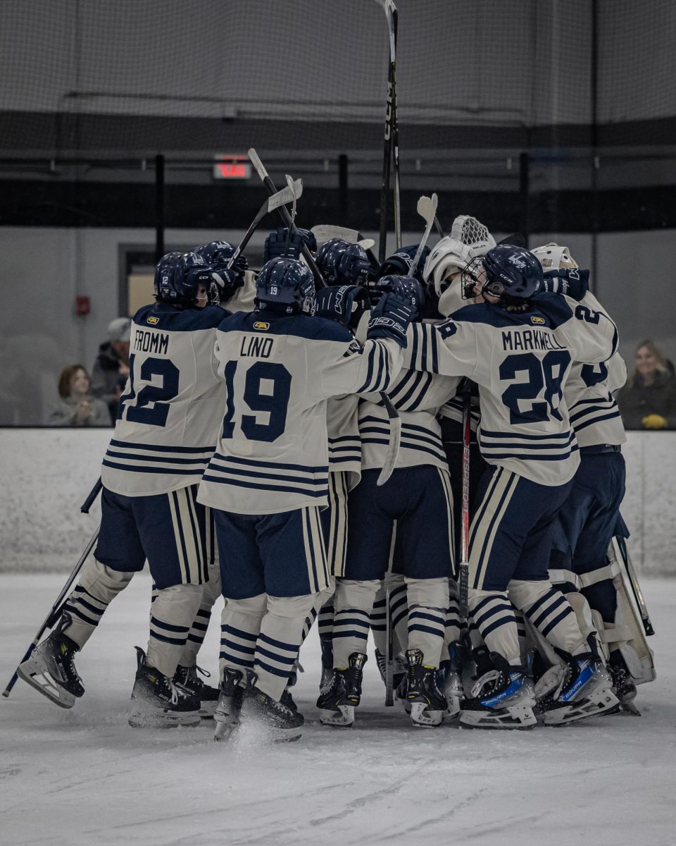 The Prior Lake girls hockey team gathers to celebrate a win during the 2024-25 season. Courtesy photo/Caty Mawing Photography