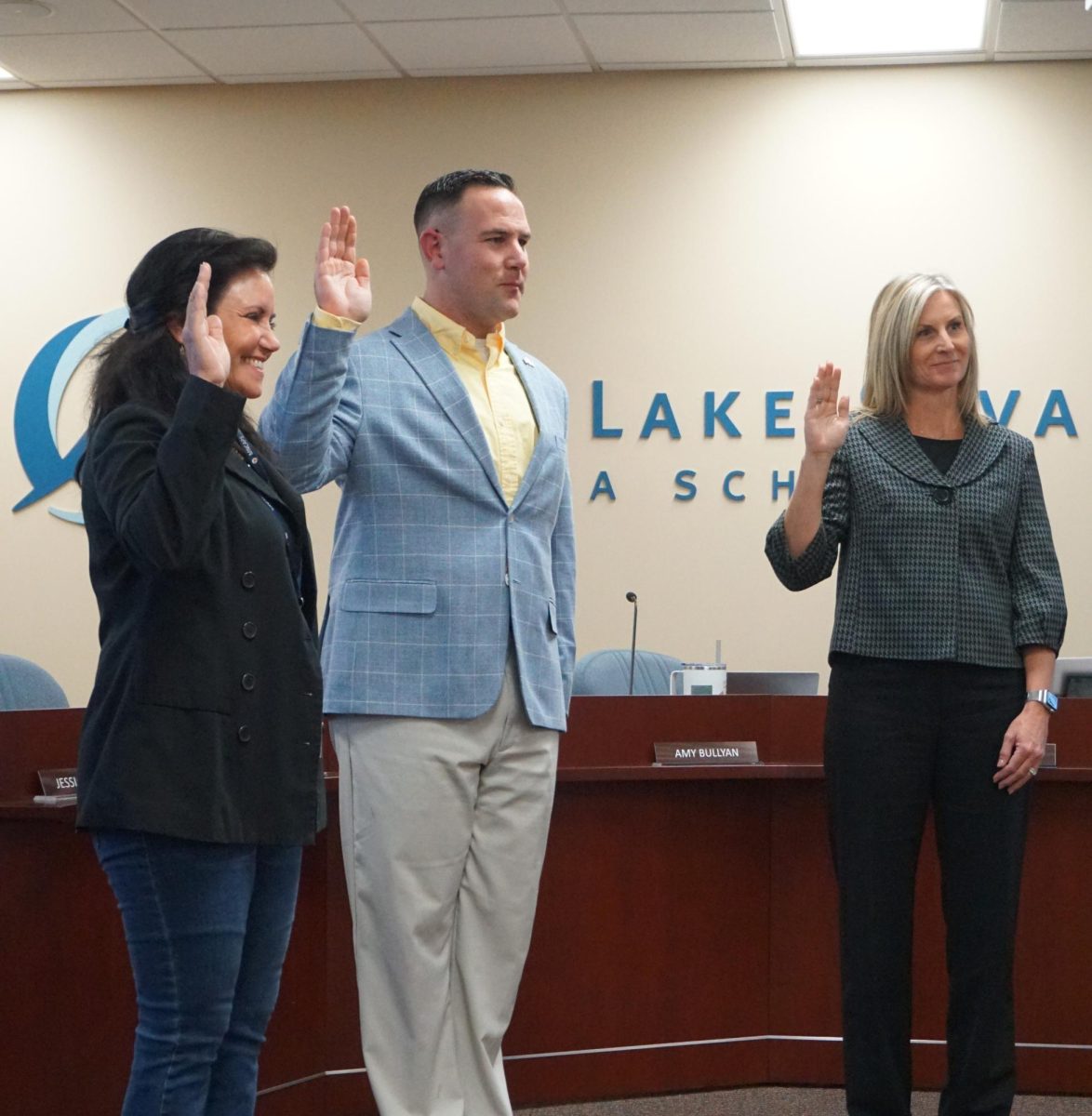 Prior Lake-Savage Area Schools board directors (from left) Mary Frantz, Charles Johnson and Jessica Mason take their oaths of office at the board's first meeting of the year on Jan. 13, 2025. Robb Jeffries / PL News Compass