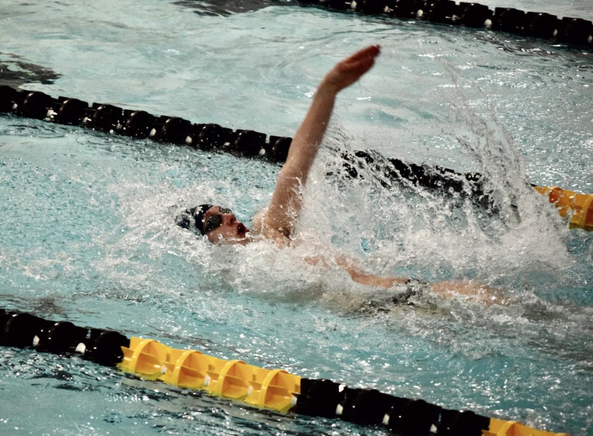 Ethan Kosin races in the 100-yard backstroke in Prior Lake's meet at Burnsville on Jan. 7, 2025. The senior set a new pool record in the event at 51.10 seconds. Submitted photo / Shawn Beaudette