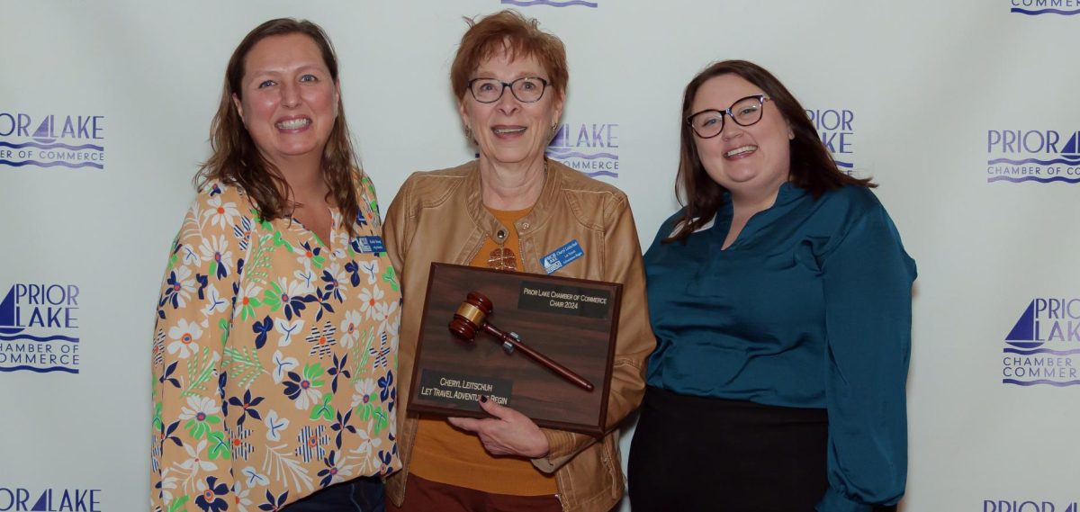 Cheryl Leitschuh (center) was thanked at the recent awards dinner for serving as the Chamber's Board Chairperson in 2024. Kathy Young (left), is now filling that role in the new year. Also pictured is Rebecca Scholz, Chamber President.