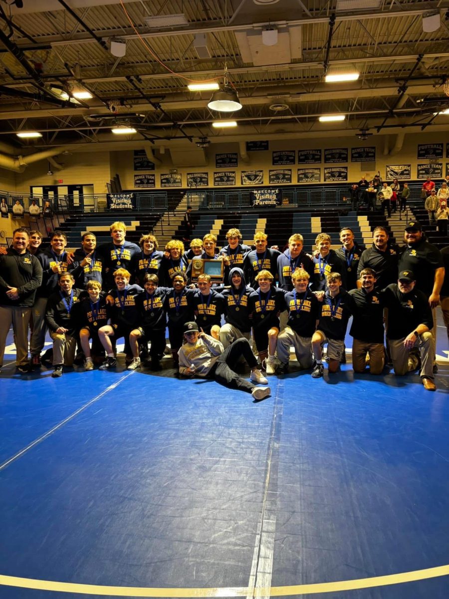 The Prior Lake wrestling team celebrates its section 2AAA team championship on Friday, Feb. 14, 2025. Submitted photo / Sunny Nelson