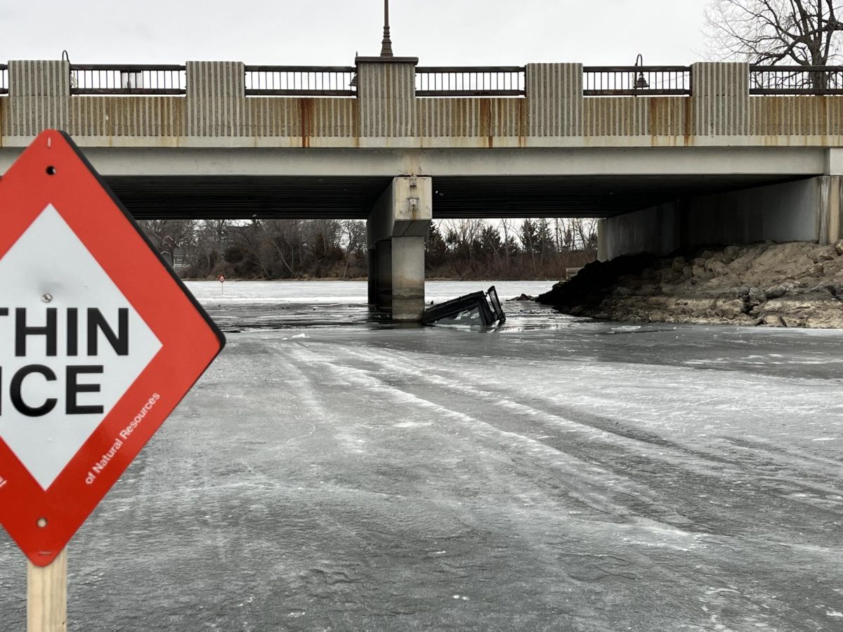 An ATV went through the ice near the Wagon Bridge on Eagle Creek Avenue over the weekend. Submitted photo / Scott County Sheriff's Office