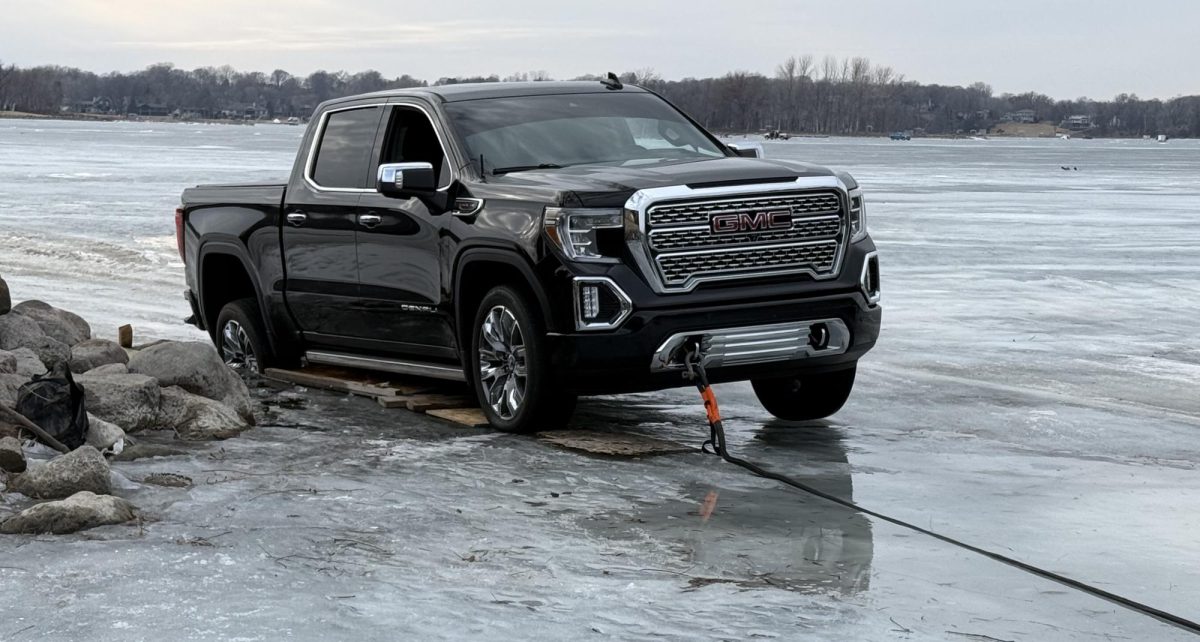 A pickup truck hit open water in Candy Cove on Feb. 2. Area residents pitched in to help the driver and his children. Submitted photo / Jeff Hanson