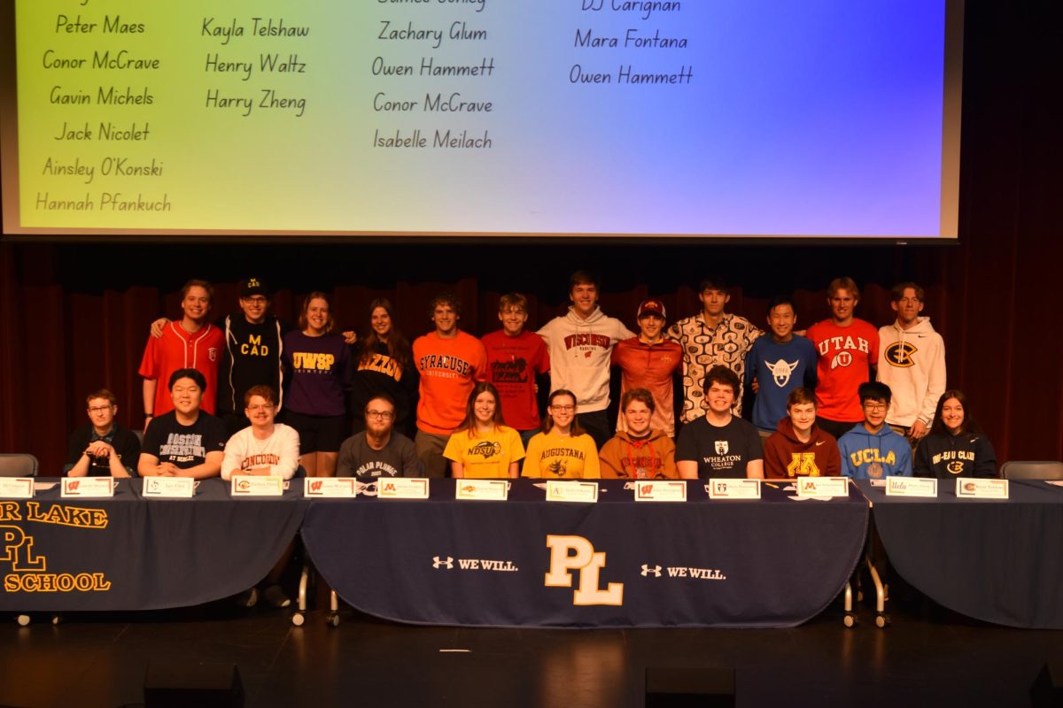 Prior Lake High School fine arts students pose during an athletic-style signing day. Twenty-six students celebrated their next steps to perform in the arts at the collegiate level. Courtesy photo / Prior Lake-Savage Area Schools