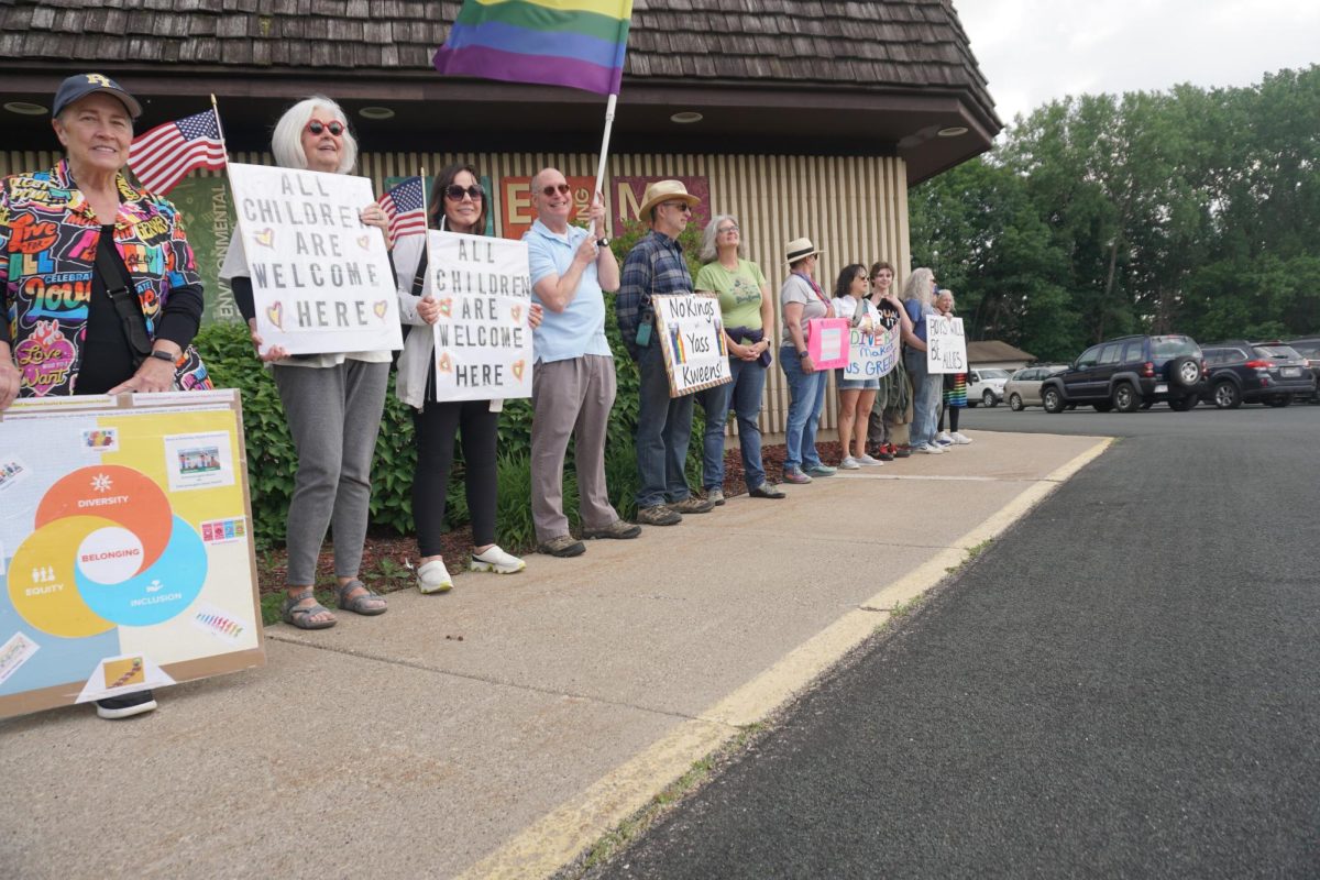Protesters line up to show support of the Prior Lake-Savage Area Schools resolution of equity and inclusion at the District Services Center on June 9, 2025. Robb Jeffries / PL News Compass