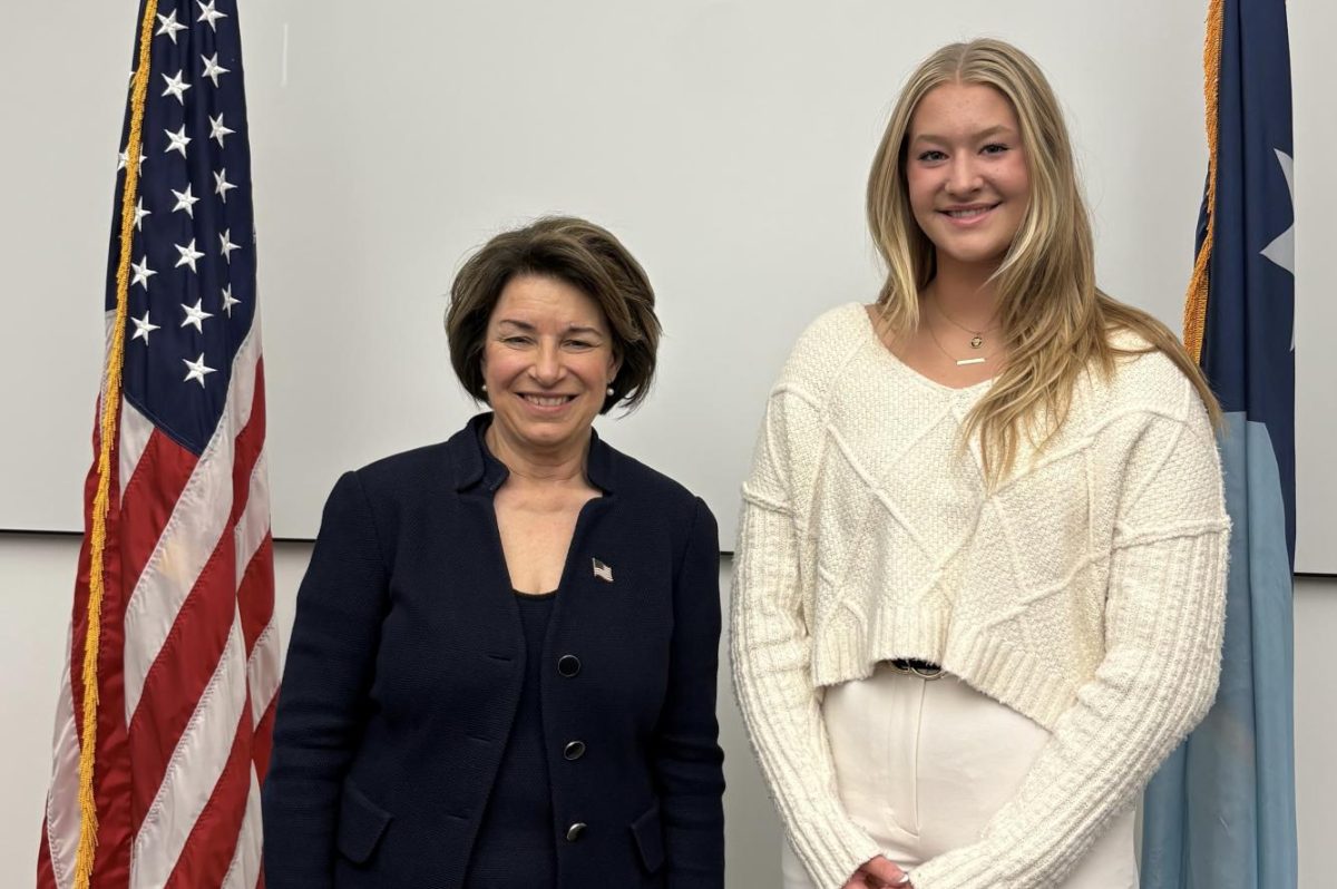U.S. Senator Amy Klobuchar congratulates Marin Harvey who will attend the U.S. Military Academy at West Point.