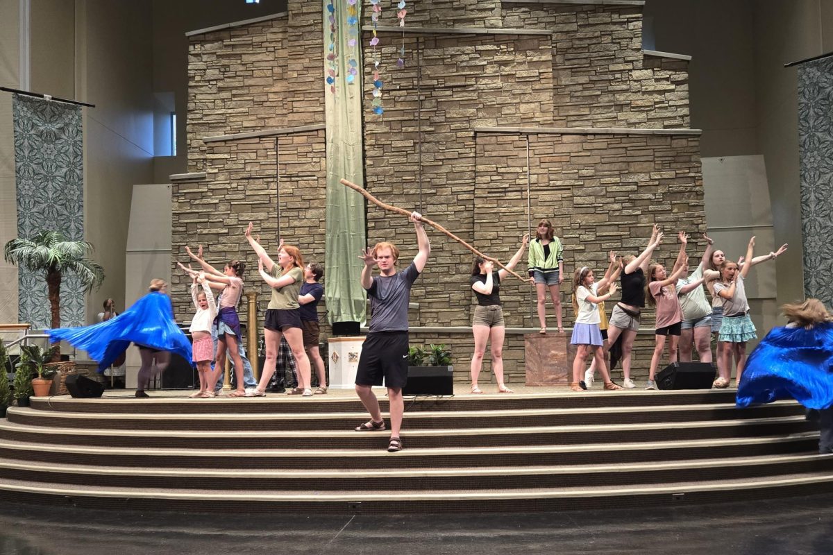 Actors in Shepherd of the Lake's presentation of "The Prince of Egypt" rehearse the scene depicting the parting of the Red Sea.