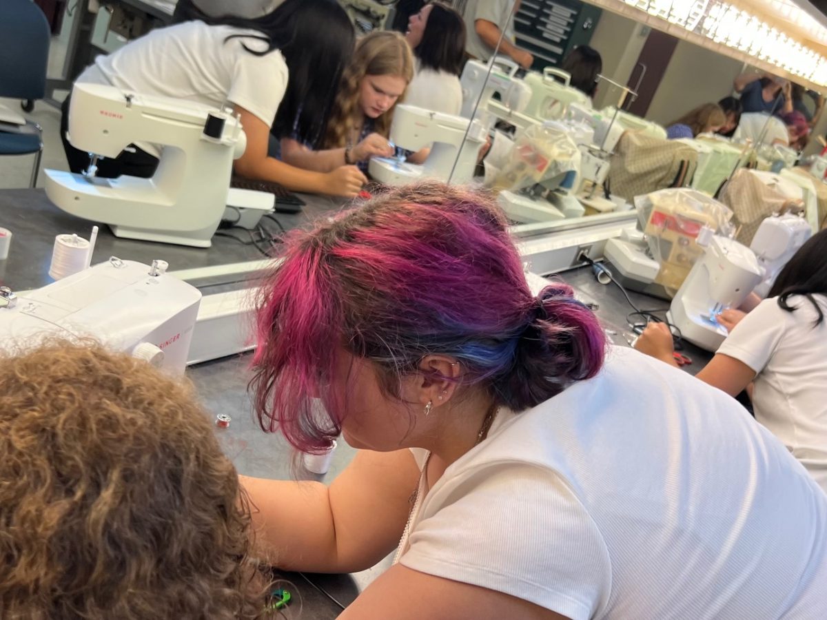 Dozens of students are working behind the scenes preparing for the PLHS performance of "Cinderella, Enchanted Edition."