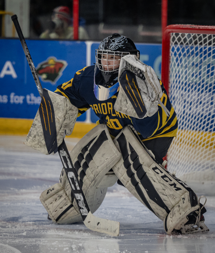 Goalie Sophia Cappiello guards the net during a Nov. 18, 2025, victory over Lakeville North. (Caty Mawing Photography)
