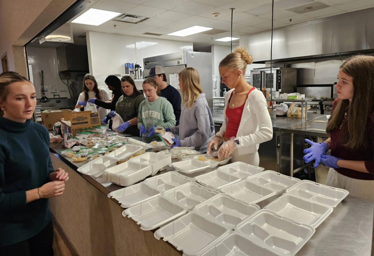 Volunteers prepared for guests attending December's Community Plate event.