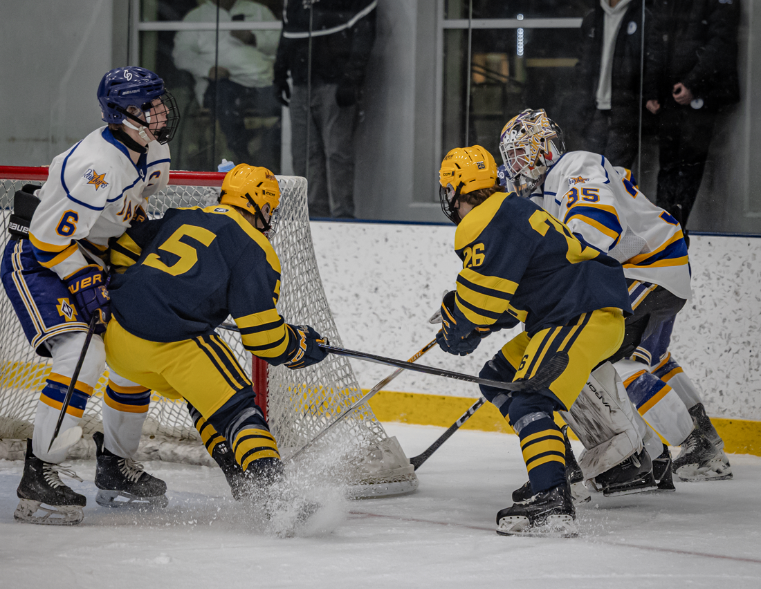Lakers boys hockey junior forward Noah Kurth (left) and sophomore forward Brayden Lake at the 2026 Tradition Holiday Invitational. (photo by Caty Mawing)