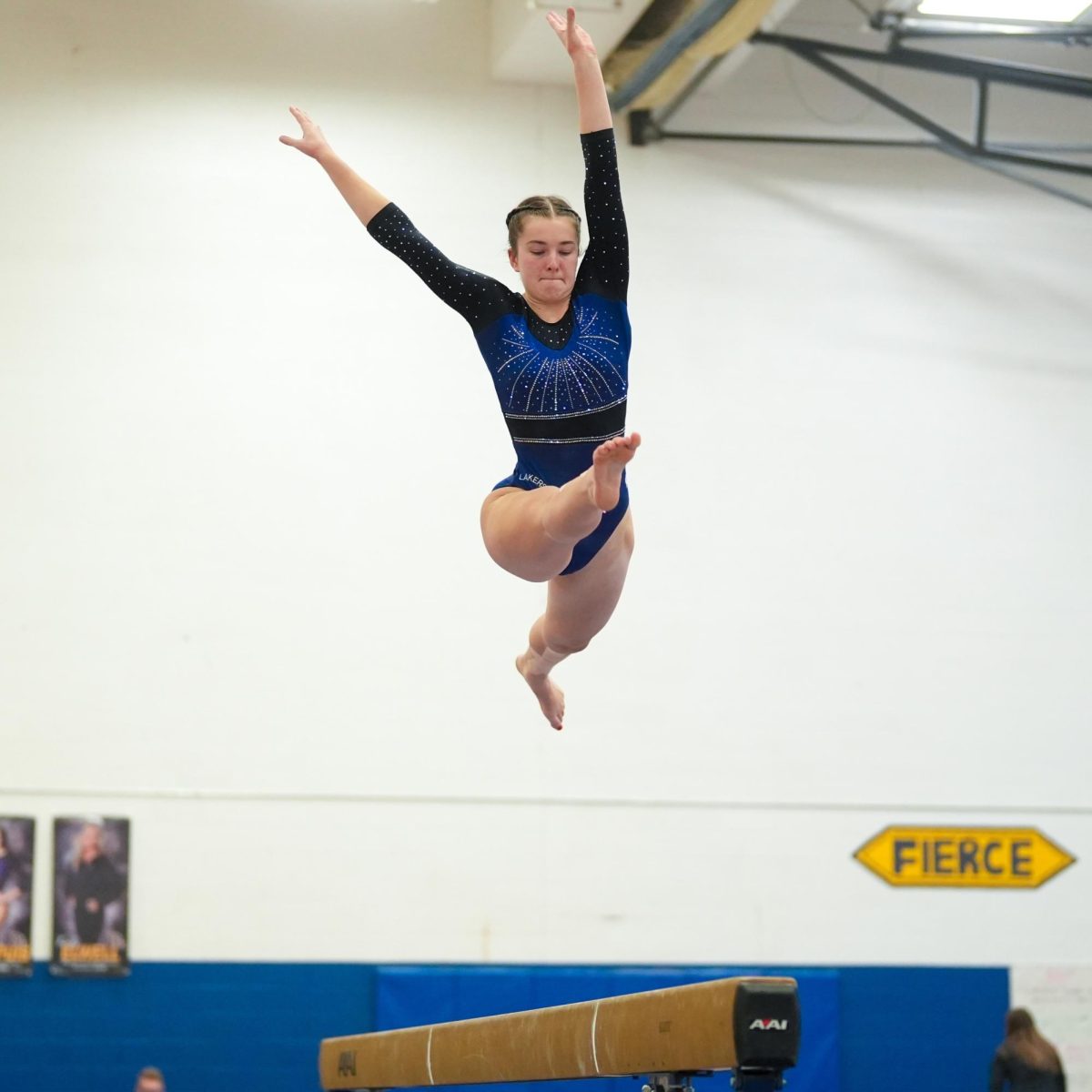 Lakers senior gymnast Madeline Chappuis capped off her senior night meet with an all-around score of 37.0, good for third-highest in school history. Her strong performance included first-place finishes in the vault,  balance beam and floor exercise and a second-place finish in uneven bars. (photo by Liv Spitzer)