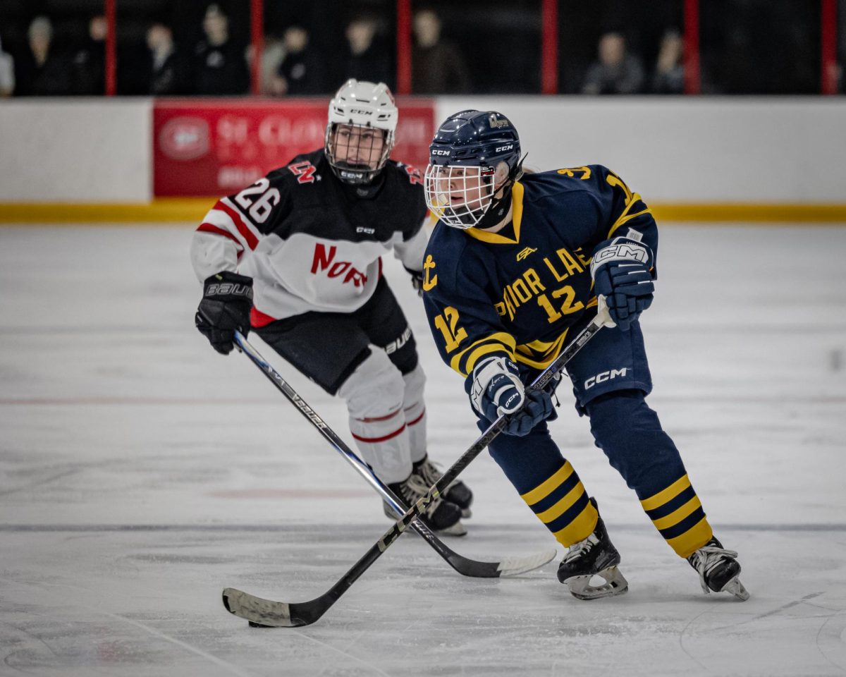 Lakers girls hockey senior defender Liv Heinicke, pictured here during a Nov. 11, 2025, match against Lakeville North, recorded a hat trick in a Jan. 20, 2026, victory over Shakopee. (photo by Caty Mawing)
