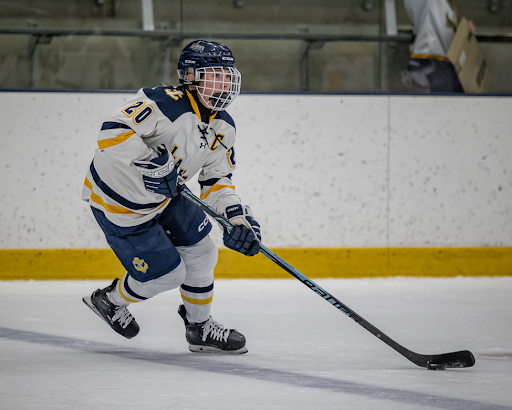 Abby Anthony scores a hat trick in the section quarterfinals (Photo by Caty Mawing Photography)