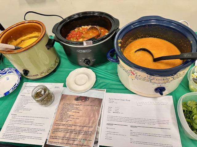 Crock pots filled with hot soups and stews were sampled by those who attended the February meeting of the "Cook Book Club." (Photo by Jill Kufrin)