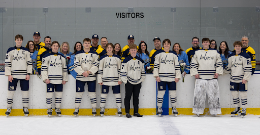 The Lakers celebrated the eight seniors on the team during the match with Eastview. (Photo by Caty Mawing Photography)