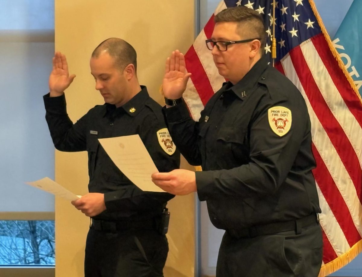 Dave Ahmann (left) and Spenser Smith have been promoted within the Prior Lake Fire Department and recognized for their new roles during the March 24 city council meeting. (Photo provided by City of Prior Lake)