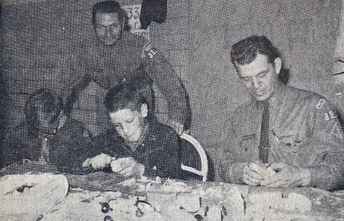 Prior Lake's Boy Scout Pack 331 walked off with blue ribbon honors at the Wacouta Scout Fun Fair with their entry of "Pinewood Derby Racers." From left to right are Cub Scouts Rex Peterson, Ronald Lutz and John Lutz, assistance Cubmaster. Standing is Cliff Peterson, assistant Cubmaster. Pack 331 was invited to participate in the Indianhead Council's Metropolitan Scout Fun Fair at the state fairgrounds. Lyle Grimmer served as the Cubmaster in 1966 for Pack 331, which was sponsored by the Prior Lake Lions Club.