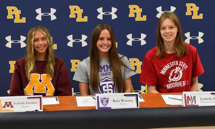 Laker student-athletes signing their NLI last week included, from left to right, Isabelle Gordon, Kaia Wozney and Isabella Ritz.