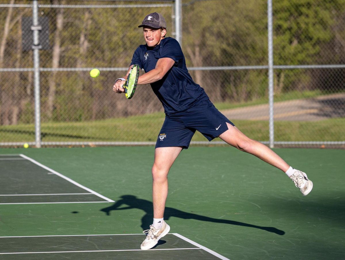 Prior Lake junior Andy Klema eyes the ball during his #2 singles match against New Prague on May 14.