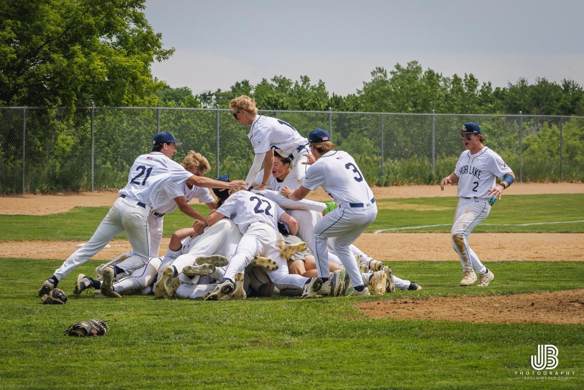 The Lakers celebrated the victory over Chaska and a trip to the state tournament. (Justin Braun Photography)