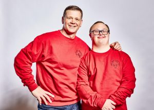 Adam Hjerpe and his son, Steven, will be working throughout the coming week to ensure 75,000 fans are welcomed to the Special Olympics USA Games being held in the Twin Cities.