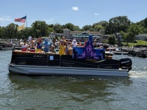 Boats decorated with creative themes are always crowd-pleasers during the July 4 parade.